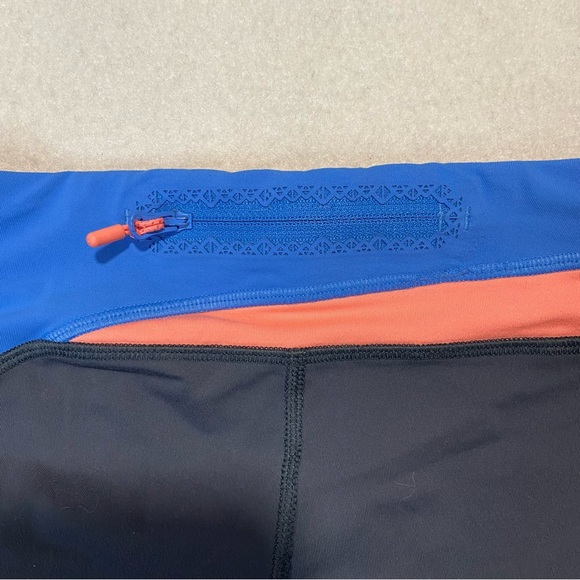 LULULEMON IVIVVA Girls Hyper Track Crops Pop Orange Coal Pool Blue Size 8 - Picture 8 of 9